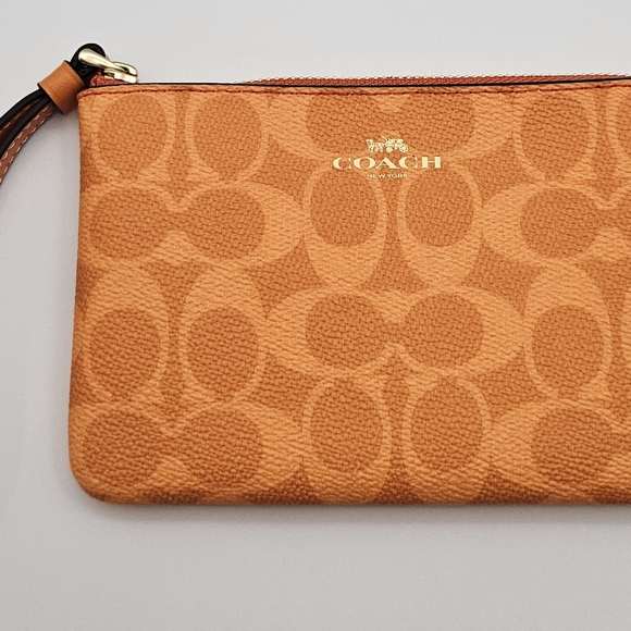 Coach Signature Orange Wristlet - Picture 1 of 4